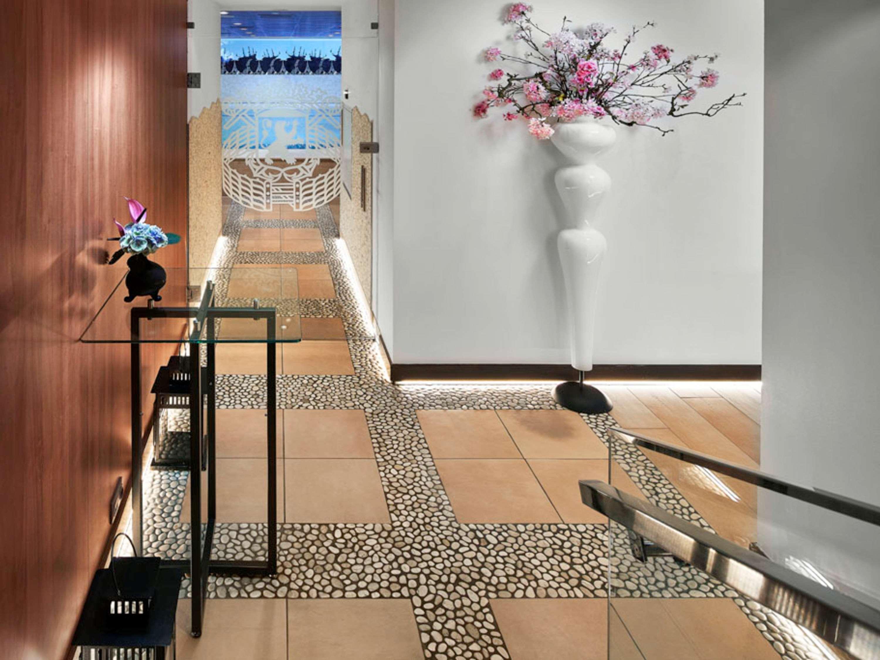 Sofitel Legend The Grand Amsterdam Hotel Exterior photo A floor designed with a pebble mosaic
